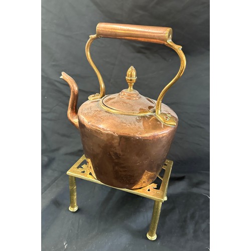 55 - Copper kettle on stand, height of kettle approximately 10 inches