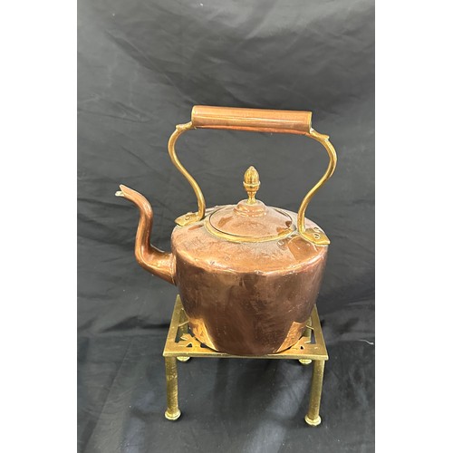 55 - Copper kettle on stand, height of kettle approximately 10 inches