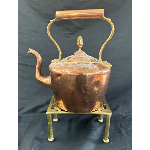 55 - Copper kettle on stand, height of kettle approximately 10 inches