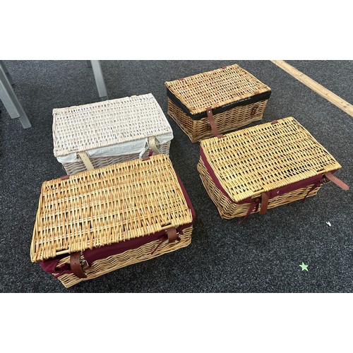 243 - Four vintage wicker picnic baskets largest measures approx 18 inches long by 12 inches deep and 8 in... 