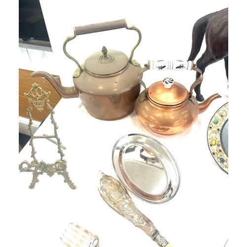 242 - Selection of collectable items to include two copper kettles, leather horse, some brass and EPNS