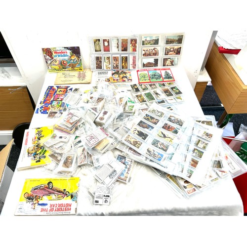 261 - Large selection of vintage cigarette cards to include Wills, Wonders of Wildlife, Brookbond etc