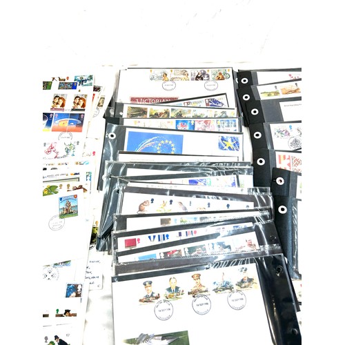 258 - Large quantity of vintage first day covers to include Police, Dinosaurs, Communications etc