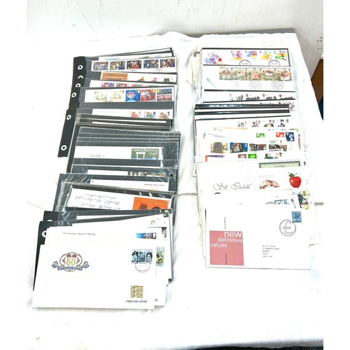 258 - Large quantity of vintage first day covers to include Police, Dinosaurs, Communications etc