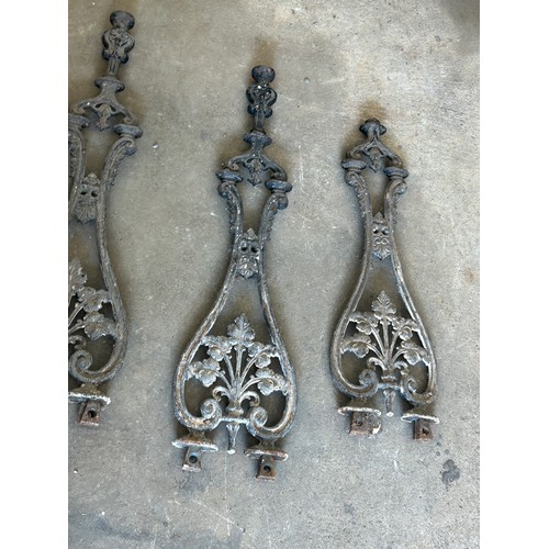 100J - 4 cast iron balustrades, approximate measurements: 13 inches tall by 13 inches width