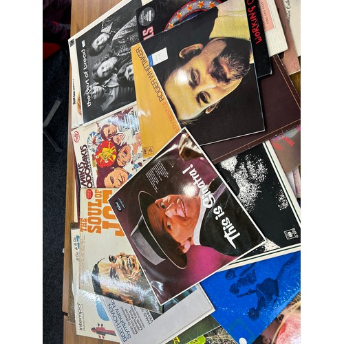 145 - Large selection of vinyl LPS from 60s, 70s and 80s to include The Carpenters, Bob Dilan, Motown etc