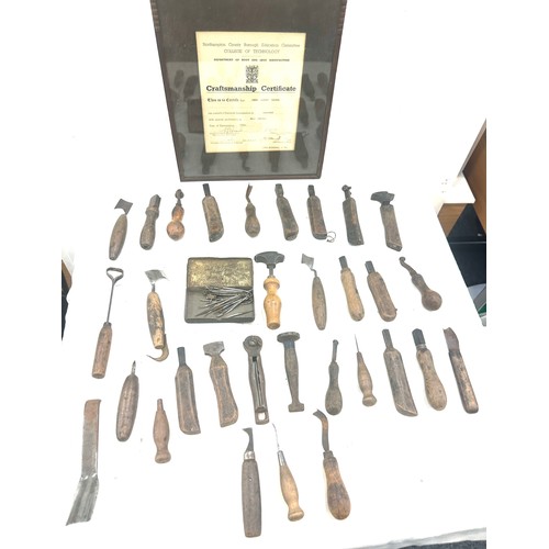 56 - Selection of vintage shoe makers wooden tools together with a Craftmanship certificate