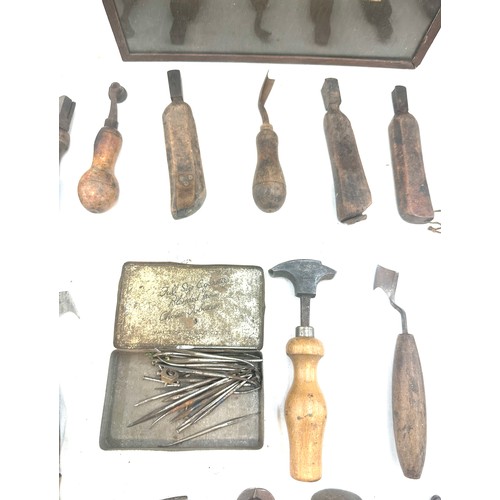 56 - Selection of vintage shoe makers wooden tools together with a Craftmanship certificate