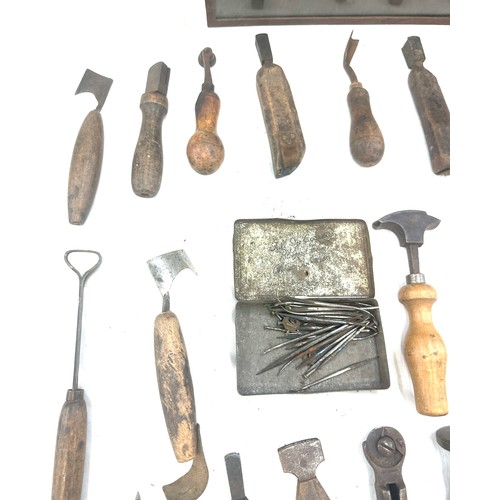 56 - Selection of vintage shoe makers wooden tools together with a Craftmanship certificate