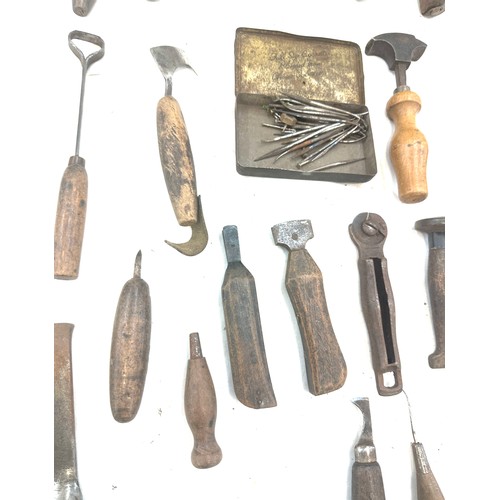 56 - Selection of vintage shoe makers wooden tools together with a Craftmanship certificate