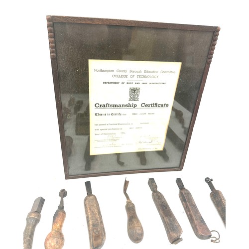 56 - Selection of vintage shoe makers wooden tools together with a Craftmanship certificate