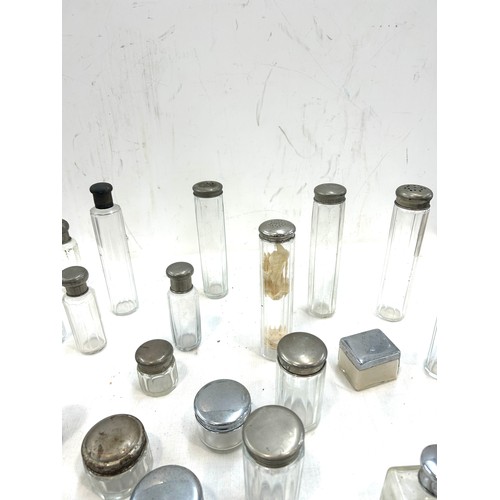 43 - Large selection of vintage and later glass bottles includes scent, pepper etc