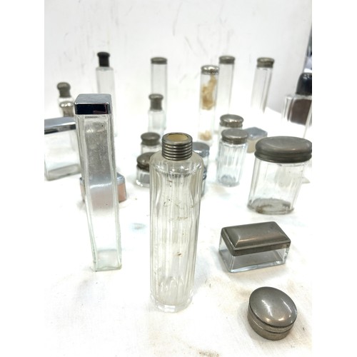 43 - Large selection of vintage and later glass bottles includes scent, pepper etc