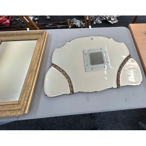 80 - Two vintage wall hanging mirrors one gilt framed largest measures approx 26 inches wide by 19 inches... 