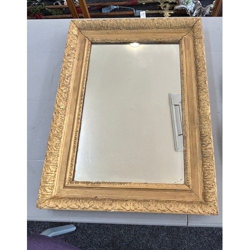 80 - Two vintage wall hanging mirrors one gilt framed largest measures approx 26 inches wide by 19 inches... 