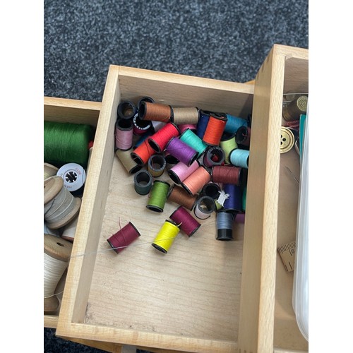 244 - Sewing box and a large selection of contents