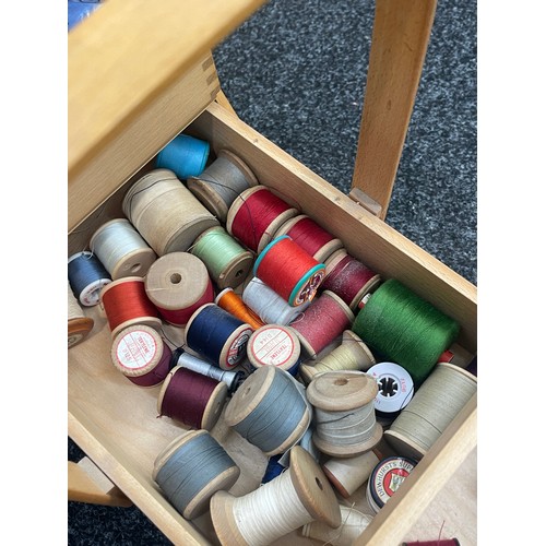 244 - Sewing box and a large selection of contents