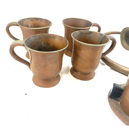 62 - Selection of vintage copper signed handled cups, a strainer and a brass horn