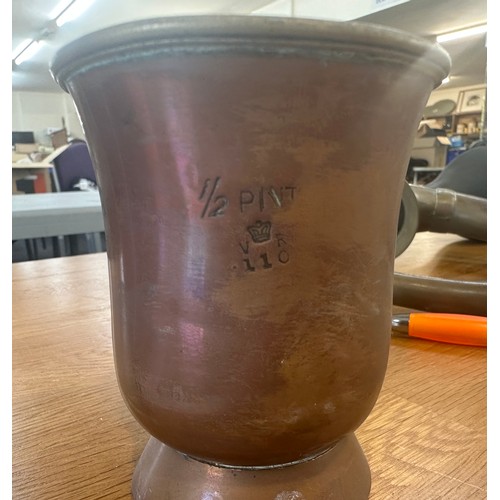 62 - Selection of vintage copper signed handled cups, a strainer and a brass horn