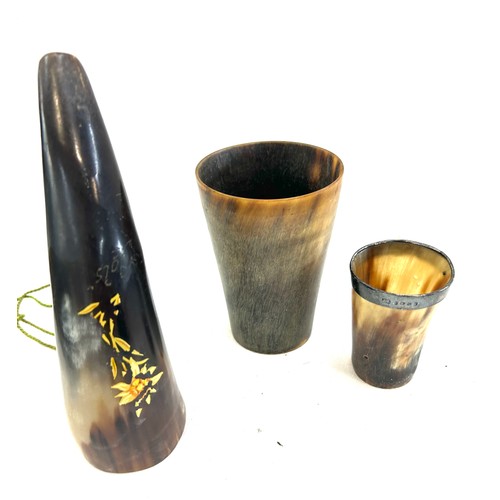 22 - Three pieces of antique horn one hand painted horn and two cups one silver rimmed