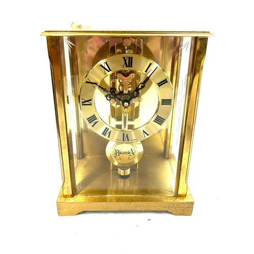 11 - Vintage brass mantel clock signed S.Haller Germany measures approx 8 inches tall by 5.5 inches wide