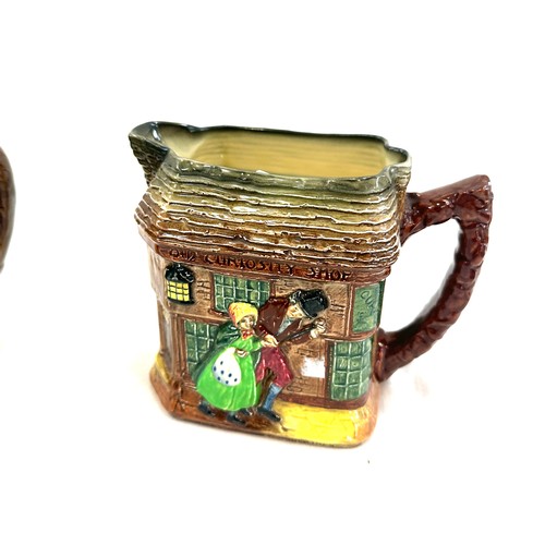 20 - Two vintage Royal Doulton Jugs one 'The Pickwick Papers by Charles Dickens' and the other ' Old Curi... 