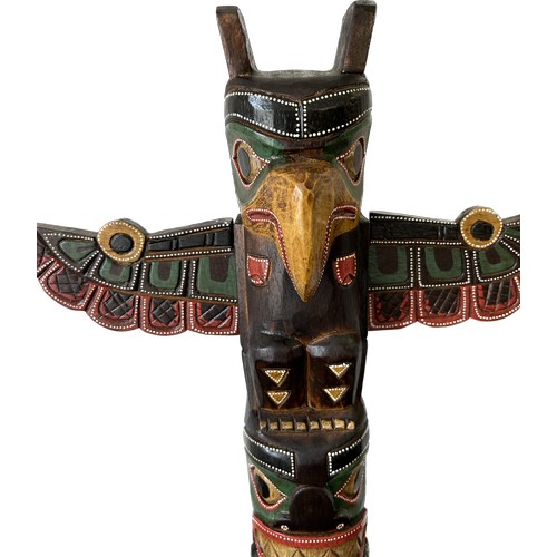 120 - Small novelty wiiden totem pole ,approximate height 24 inches, width 18 inches