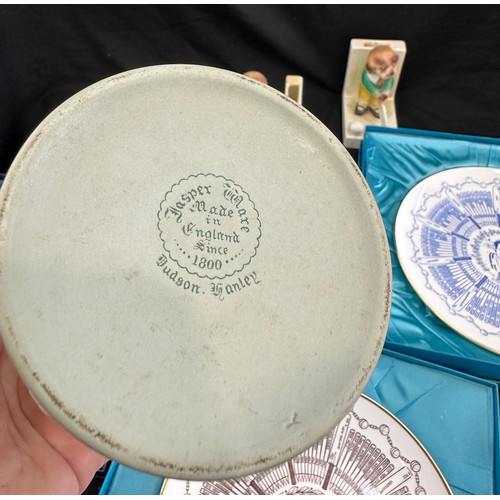 252 - Selection of cricket pottery items to include novelty book ends, Coalport plates etc