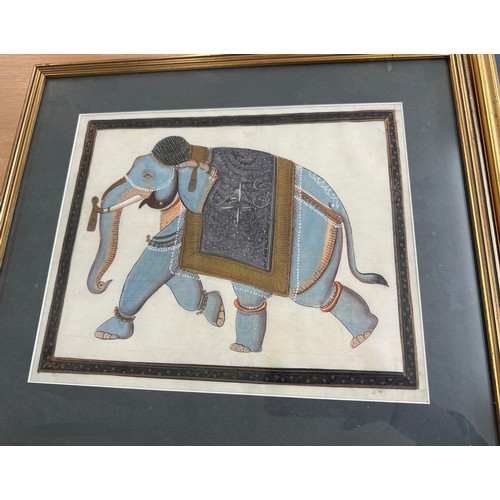 126 - Selection of framed hand painted elephants on cloth largest measures 16.5 inches tall by 20 inches w... 