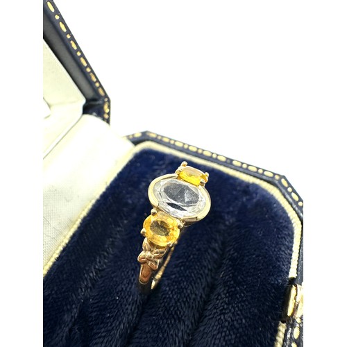 77 - 9ct Gold Blue & Yellow Topaz Three Stone Ring (2g)