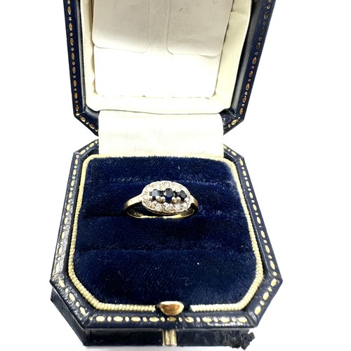 92 - 9ct Gold Sapphire & Diamond  Halo Ring (1.8g)