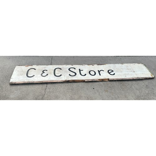 100 - Vintage wooden shop sign ' C&C Store' measures approx 107 inches long by 19 inches tall