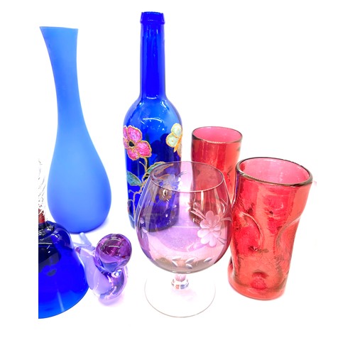 73 - Selection of coloured glassware to include vases, bells etc