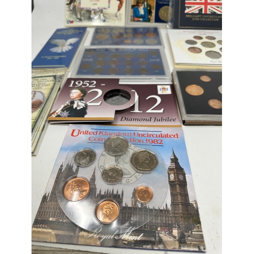 469 - Collection of  coins original packaging inc £2 coins etc