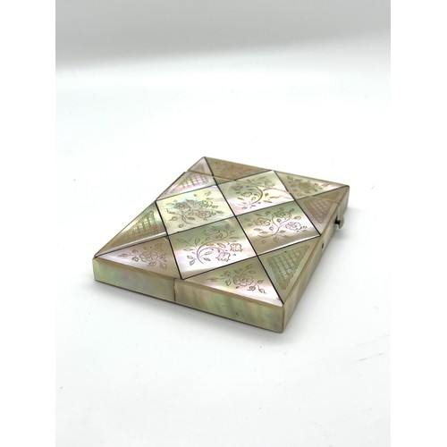 558 - Victorian mother of pearl card case in good condition