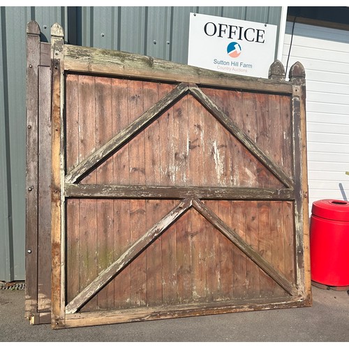 100A - Two large outdoor wooden gates each gate measures approx 2 metres high by 2 metres wide