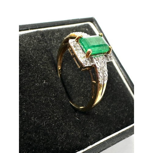 57 - 9ct gold Emerald & diamond ring weight 2.2g