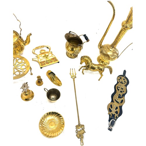 43 - Selection of brass ware includes dallah, kettle and stand etc