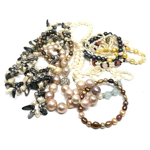 423 - Ten Cultured Pearl Necklaces And Bracelets (333g)