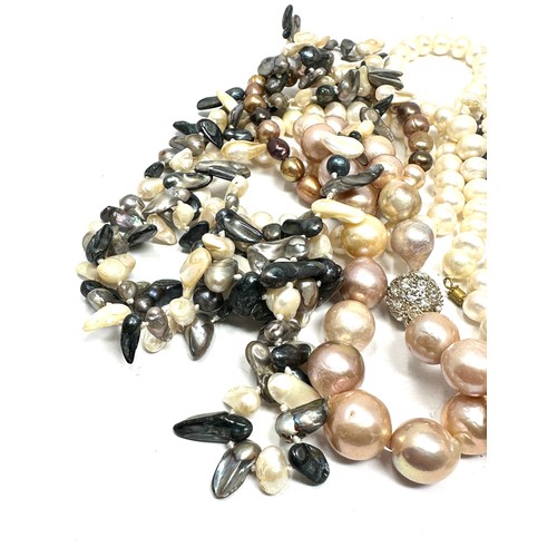 423 - Ten Cultured Pearl Necklaces And Bracelets (333g)