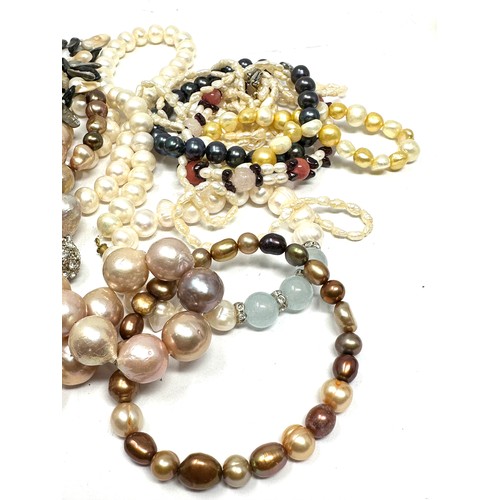 423 - Ten Cultured Pearl Necklaces And Bracelets (333g)