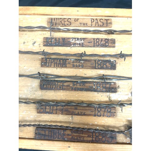 57 - Vintage barb wires of the past signed by John Mass measures approx 22 inches long by 11.5 inches tal... 