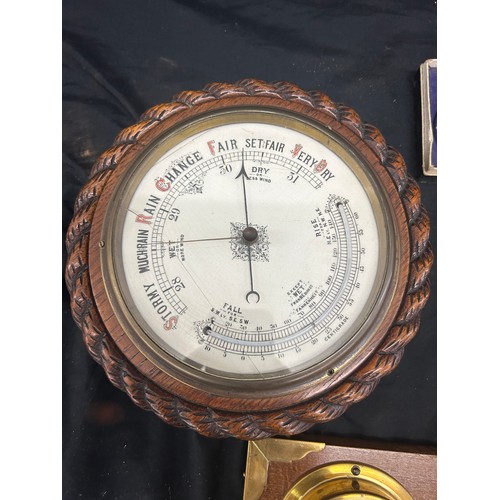 60 - Selection of vintage barometers and a volt meter