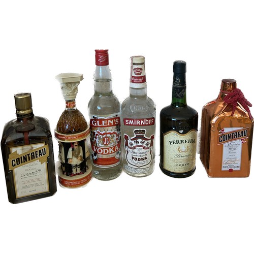 589 - Selection of sealed Vodka and Liquers to include Smirnoff, Cointreau etc