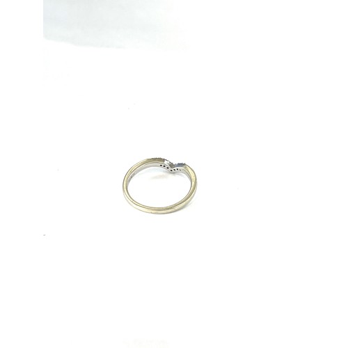 567 - 9ct Gold diamond wishbone ring, 2 grams