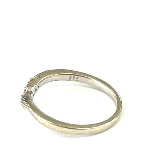 567 - 9ct Gold diamond wishbone ring, 2 grams