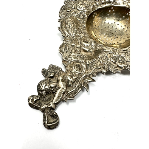 20 - Antique silver cherub strainer