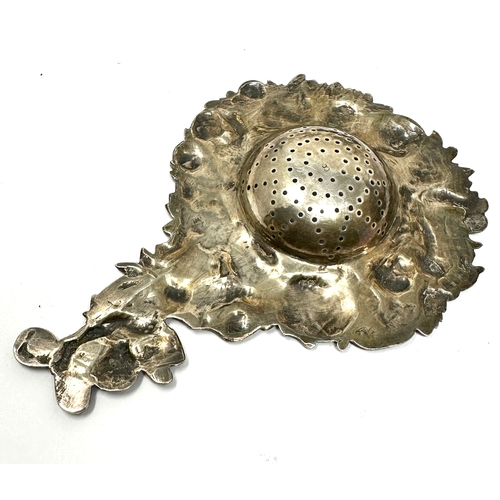 20 - Antique silver cherub strainer