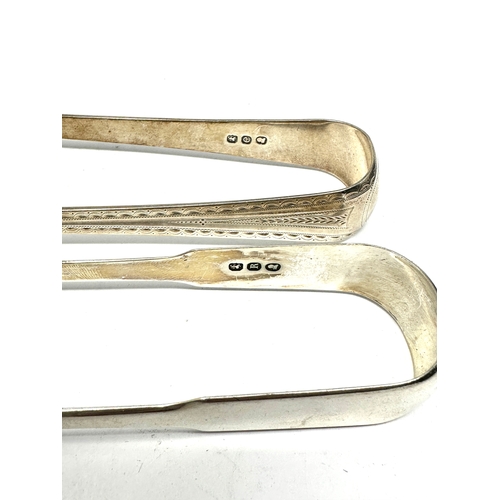 29 - 2 georgian silver sugar tongs