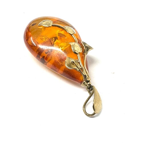 99 - 9ct Gold Polished Natural Amber Pendant (7.4g)